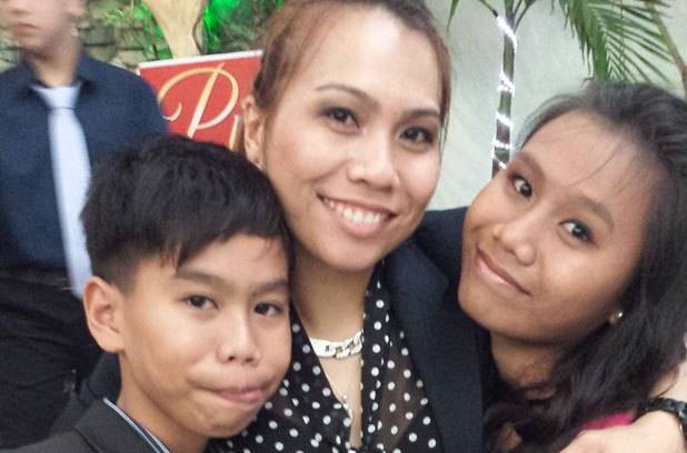 Jesapher Diaz Dumanjug is waiting to be reunited with her son and daughter.